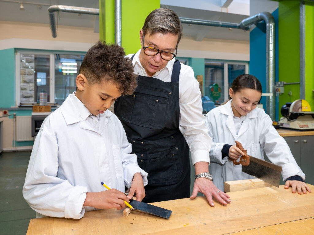 Sharon Mayo Head Of Design Technology At Duchy College Working With Pupils In The New Design Technology Department